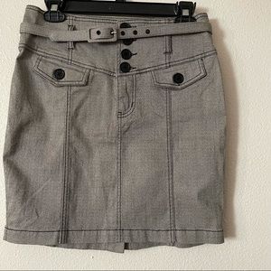 Super cute high waisted button up skirt.